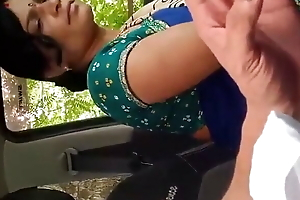 Aunty giving blowjob in auto