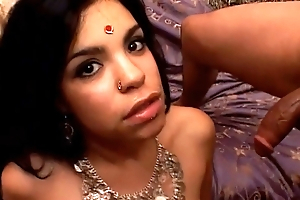 Cute Indian ecumenical with saggy tits receives duo cumshots on her face