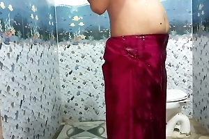 Indian young bhabhi rinsing surrounding petticoat bath