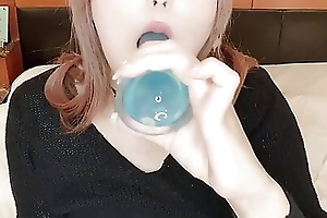 She sucks a catch dildo hard in her mouth