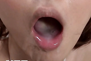 Exotic Asian pornstar gives a sensational blowjob in a porn video