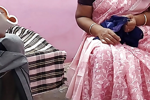 Tamil aunty was sitting chiefly the chair and working I gently stroked her thigh and sucked as a result many breasts and had hot sex with her.