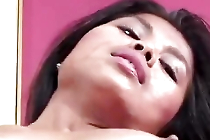Exotic Asian is a pro at sucking plus making out cock