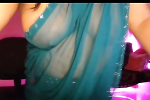 Bhabhi, crazy with the hooch for hot youth, is enjoying by opening will not hear of bra and showing will not hear of boobs through the saree.