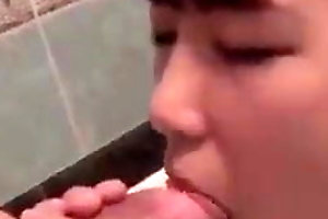 Japanese girls nearly slow BJ in the bathtub